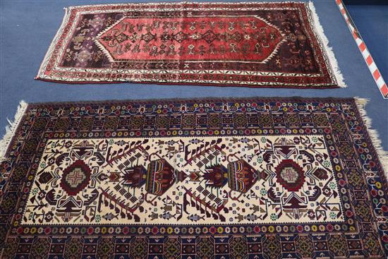 Two Persian rugs, 210 x 110cm & 200 x 102cm